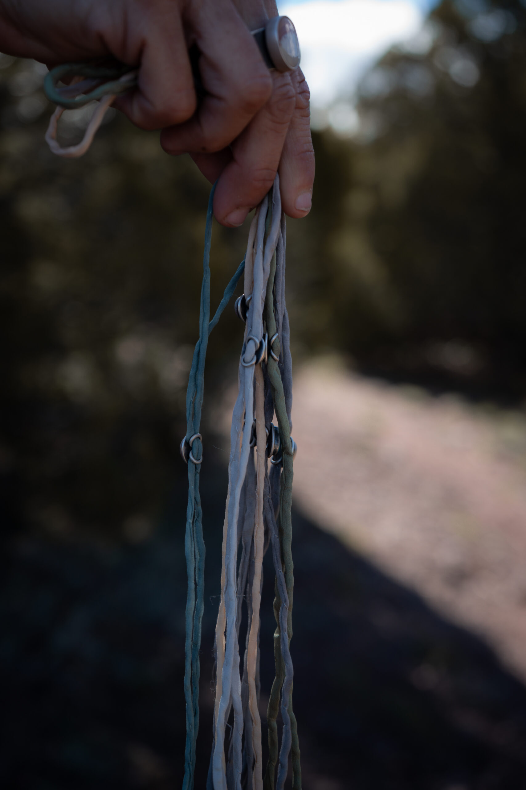 Lone Mountain Turquoise Bolo on a Gray Silk Cord - Image 3
