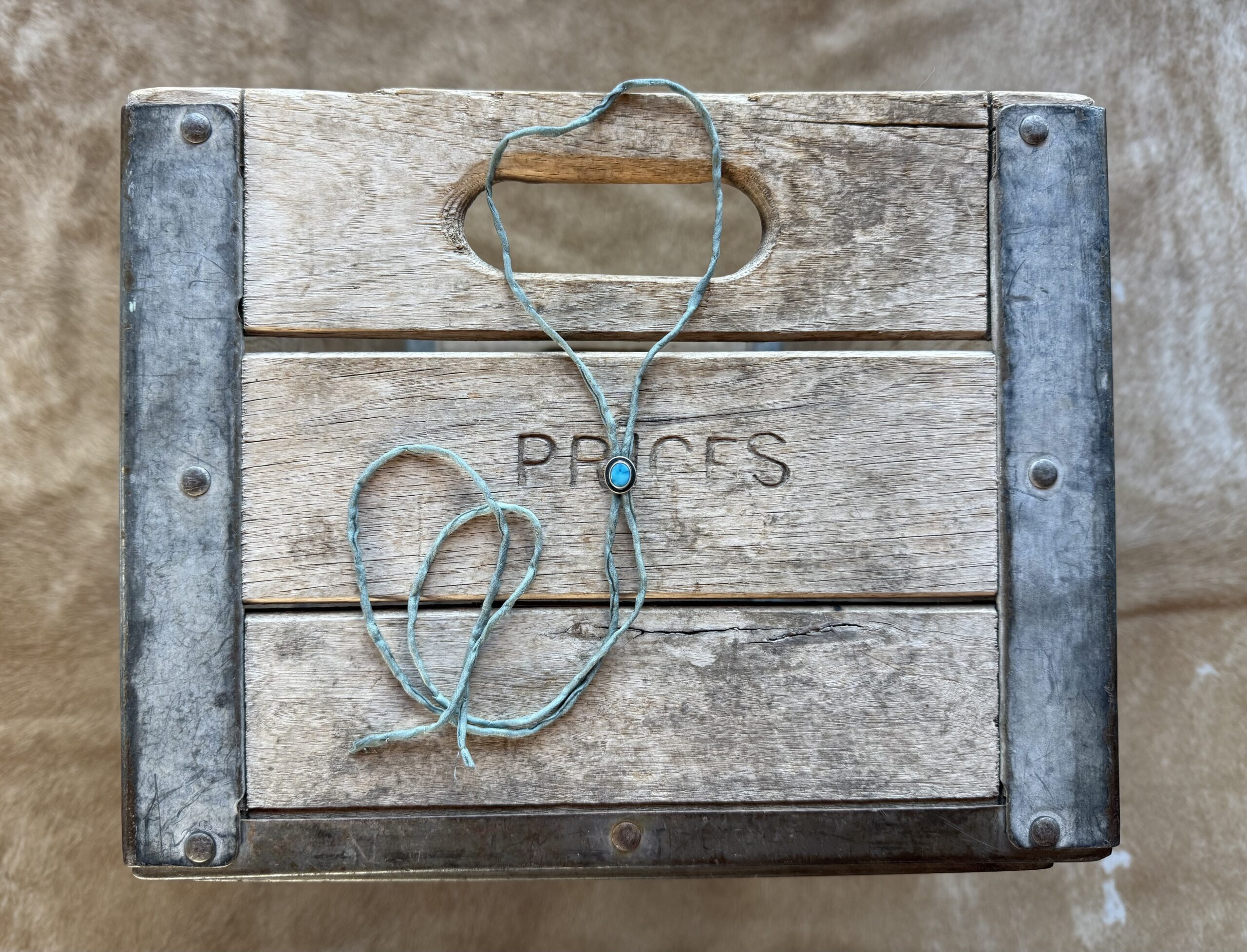 Lone Mountain Turquoise Bolo on a Blue/ Gray Silk Cord